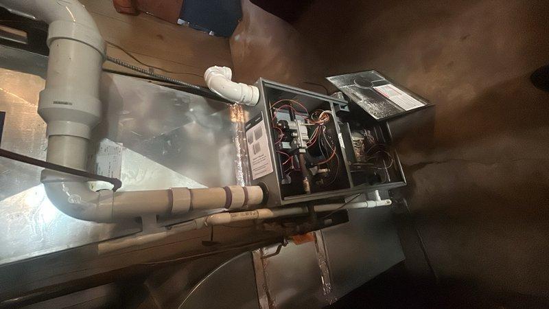 Diagnosed non-ignition issue on furnace where customer reported thermostat set to 70°F with actual temperature reading 58°F. Inspection of the unit revealed electrical component malfunction requiring replacement of control board and associated wiring. Complete system evaluation determined aging unit would benefit from full replacement rather than continued repairs to ensure reliable heating performance and proper ventilation through existing PVC ductwork.