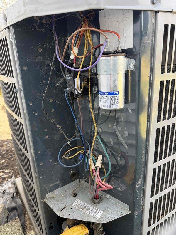 Completed spring preventative maintenance on air conditioning system per comfort plan agreement. Performed comprehensive clean and check procedures including inspection of indoor air handler with airflow verification, and outdoor condensing unit electrical components including capacitor, contactor, and associated wiring connections. All components found operating within normal parameters and system returned to service.