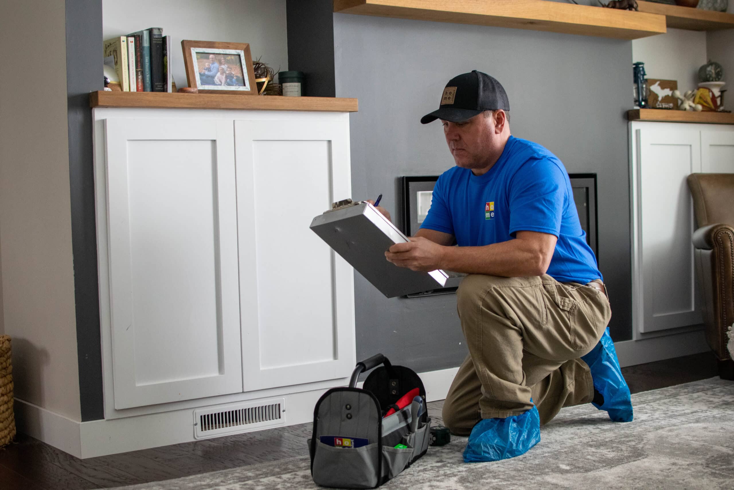 Home Comfort technician performing an AC maintenance appointment