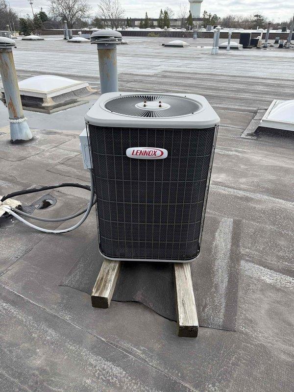 Completed spring preventive maintenance on commercial rooftop Lennox condenser unit per prepaid maintenance agreement. Performed comprehensive checklist inspection, documented current equipment specifications and filter information, captured photographic documentation of unit condition showing normal weathering and outdoor exposure. Coordinated tenant availability prior to service access as required.