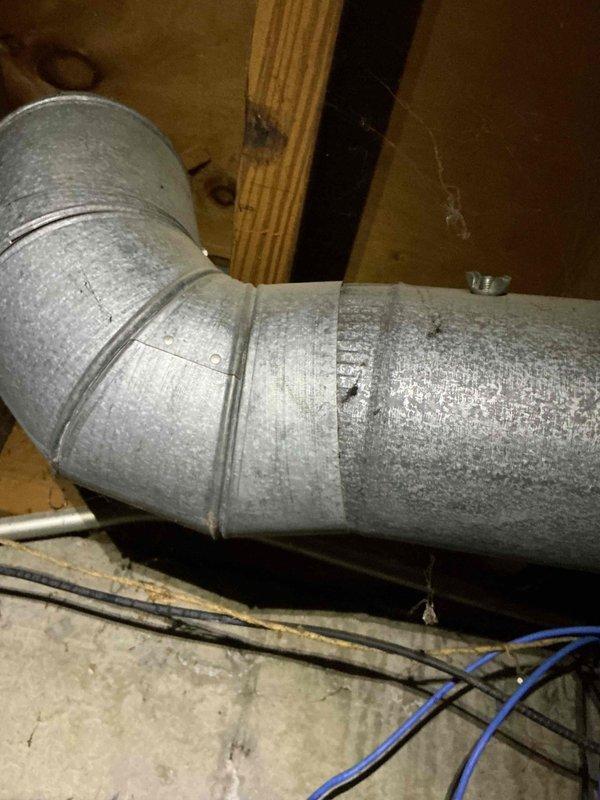 Responded to service call for fallen ductwork in crawl space. Upon inspection, found detached galvanized metal duct elbow joint that had separated from the main furnace supply run. Secured and reinstalled the disconnected duct section, ensuring proper alignment and connection to the existing ductwork. Fastened all joints with appropriate metal bands and clamps to prevent future separation. Verified system airflow and confirmed all ductwork connections were secure and properly sealed throughout the accessible crawl space area.