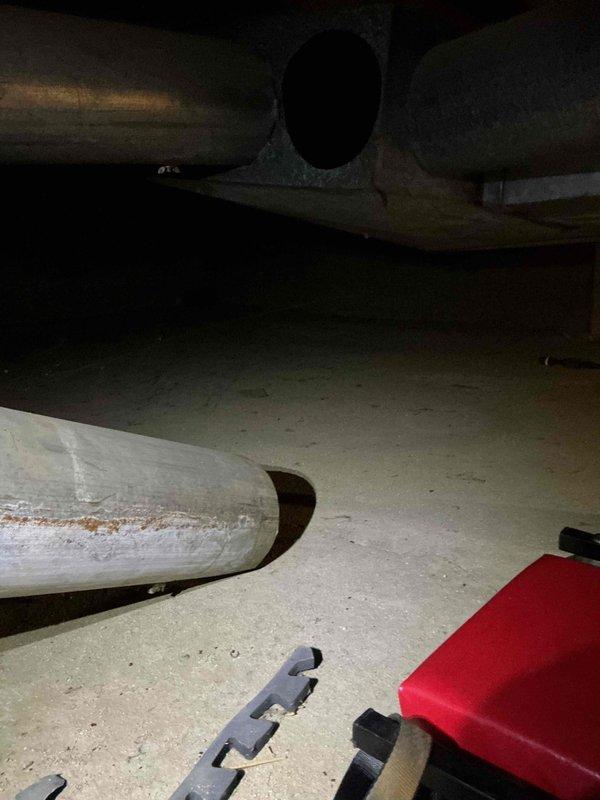 Responded to service call for fallen ductwork in crawl space. Upon inspection, found detached galvanized metal duct elbow joint that had separated from the main furnace supply run. Secured and reinstalled the disconnected duct section, ensuring proper alignment and connection to the existing ductwork. Fastened all joints with appropriate metal bands and clamps to prevent future separation. Verified system airflow and confirmed all ductwork connections were secure and properly sealed throughout the accessible crawl space area.
