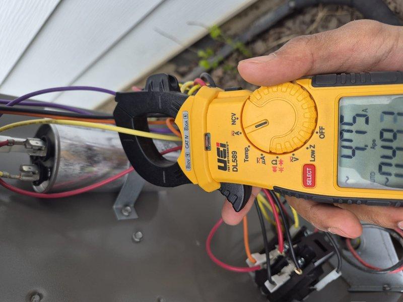 Completed air conditioning clean and check maintenance per Goodman Comfort Plan agreement. Performed electrical diagnostics using clamp meter to verify proper amperage draw on compressor and condenser fan motor, confirmed all readings within manufacturer specifications. Inspected exterior unit components, refrigerant lines, and flexible ductwork connections for proper operation and physical condition. System operating normally with no deficiencies noted at time of service.