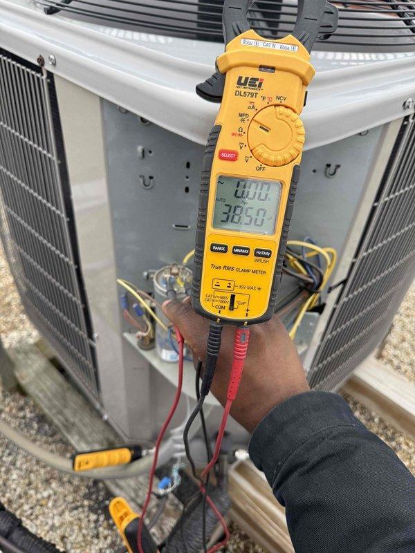 Completed comprehensive clean and check maintenance service on residential air conditioning system and air handler per comfort plan agreement. Performed thorough inspection of thermostat operation, verified proper system response and control functionality, and conducted electrical diagnostics on outdoor condensing unit including amperage measurements to confirm unit operating within manufacturer specifications.