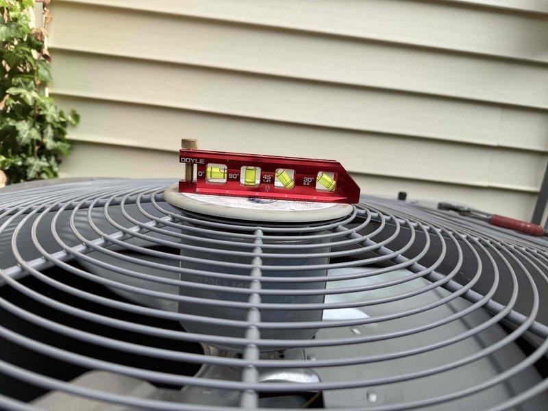 Completed Comfort Plan clean and check on single outdoor air conditioning condenser unit. Verified unit level and proper installation using torpedo level, performed standard maintenance inspection, and processed annual Comfort Plan renewal for continued preventative maintenance coverage.