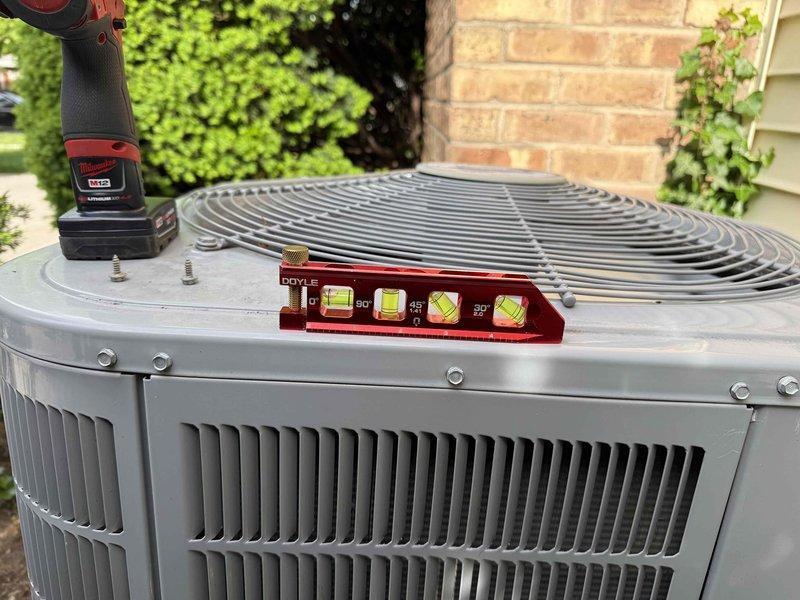 Completed Comfort Plan clean and check on single outdoor air conditioning condenser unit. Verified unit level and proper installation using torpedo level, performed standard maintenance inspection, and processed annual Comfort Plan renewal for continued preventative maintenance coverage.