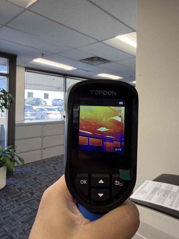 Responded to a thermostat communication issue where unit was set to 79°F but only reading 69°F. Utilized thermal imaging to inspect temperature variations in the ceiling and vents, and examined the electrical terminals and connections at the control panel. Identified and resolved the communication problem between the thermostat and HVAC system, restoring proper temperature control functionality.