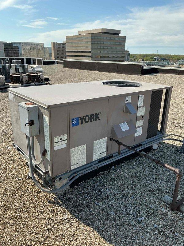 Chicago, IL - Completed thorough blower wheel cleaning on west rooftop unit (York packaged RTU). Unit was accessed, blower assembly serviced to remove accumulated debris and contamination, and system restored to proper operation with improved airflow efficiency.